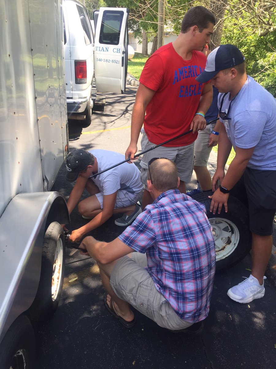 barrelofjesus's tweet photo. First blown tire on the trailer- no problem! #CIYmove2016 @BelmontCburg https://t.co/yI35tuwb35