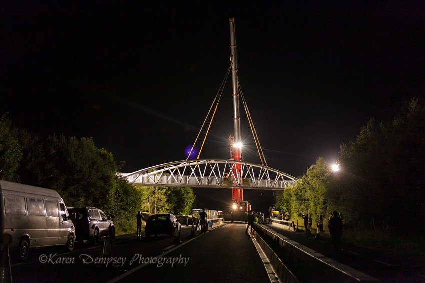 One of the stills from a time lapse of the installation of the bridge across the N25 for the @deisegreenway_