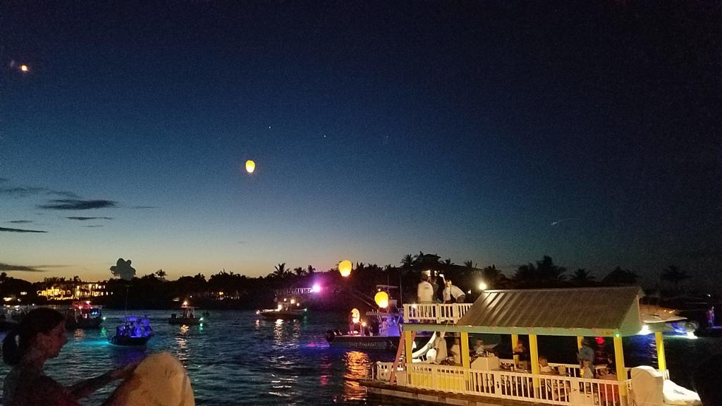 CBS12's tweet photo. Flames of support for Austin and Perry on year anniversary of their disappearance. https://t.co/Ow9eazsJl5 https://t.co/0SovHLe7x0