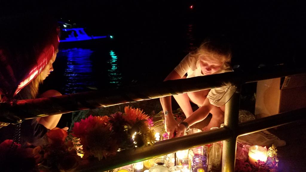 CBS12's tweet photo. Flames of support for Austin and Perry on year anniversary of their disappearance. https://t.co/Ow9eazsJl5 https://t.co/0SovHLe7x0