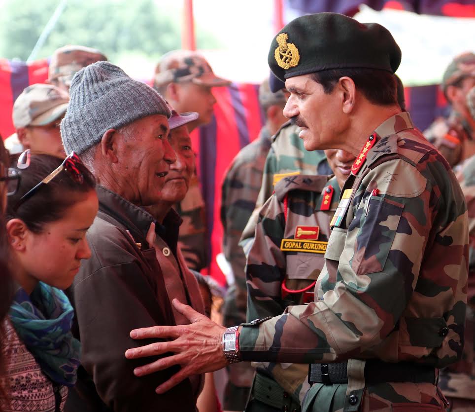 ShivAroor's tweet image. Love this photograph. Army chief Gen Dalbir Singh today with the families of Kargil heroes. #NeverForgetKargil