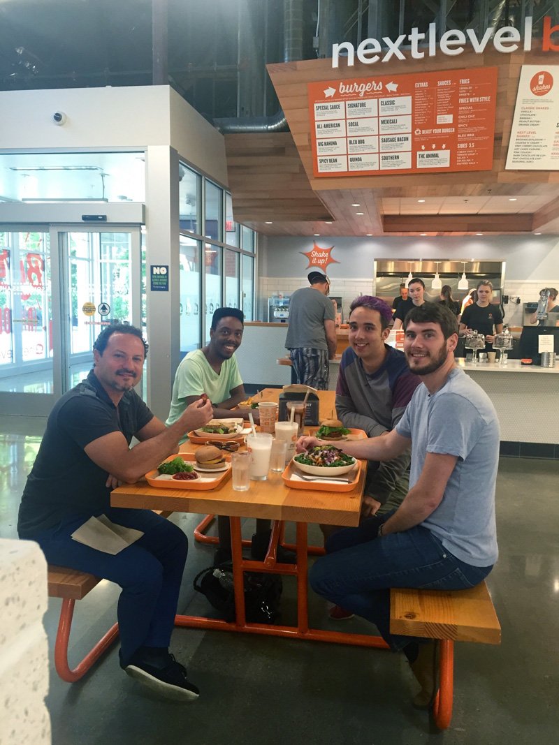 The marketing team checking out our latest work for <a href="/NextLevelBurger/">Next Level Burger</a> and stuffing our faces. Both turned out great!