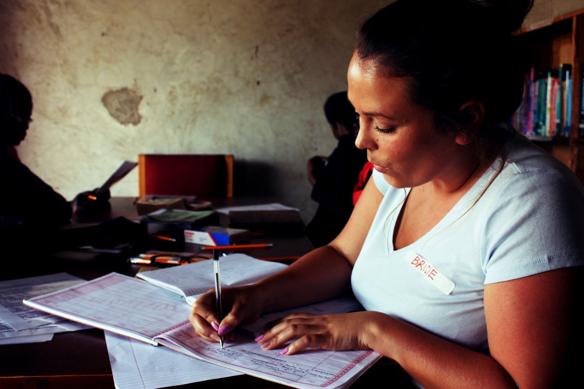 BrainJuiceEdu's tweet photo. Our Director Bridie Appleby-Gunnill signing the visitors book at the Busesa Community Library in Uganda last week https://t.co/AJlBpTtH6f