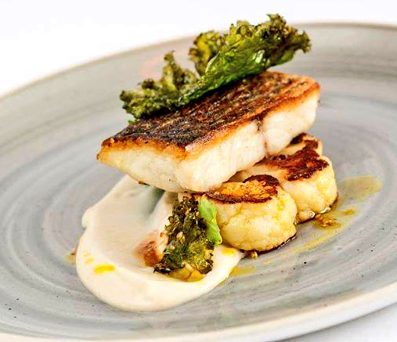 squarebistro's tweet photo. Stonebass, roast cauliflower, curry dressing, crispy kale. @BrakesIreland @ClementsGareth @ShaneYesChef https://t.co/EPSgY5DZys