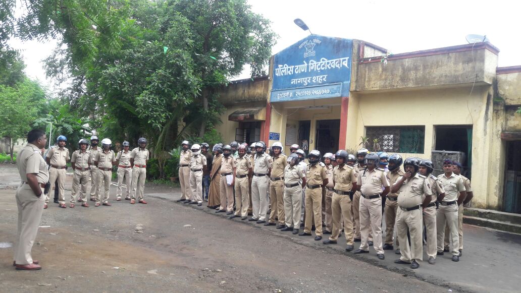 Police station Gittikhadan, Nagpur city roll call with helmets.