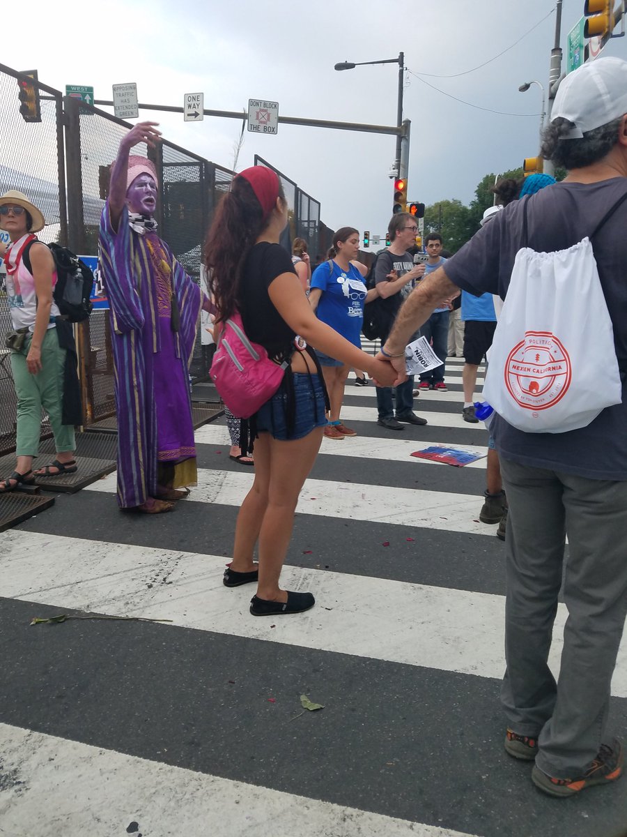 TreesDanceAlone's tweet photo. If you see omming/chanting at the #ShutDownDNC #DemConvention SHUT IT DOWN! Paid trolls to drown out our #ProtestDNC https://t.co/8CPyBdK7F2