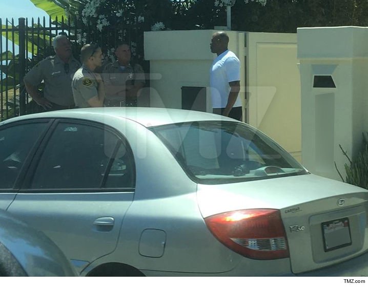 tallmaurice's tweet photo. cops handcuffed billionaire Dr. Dre in front of his own house because a man IN A KIA told them Dre had a gun? wow. https://t.co/Koxpd0UR0F