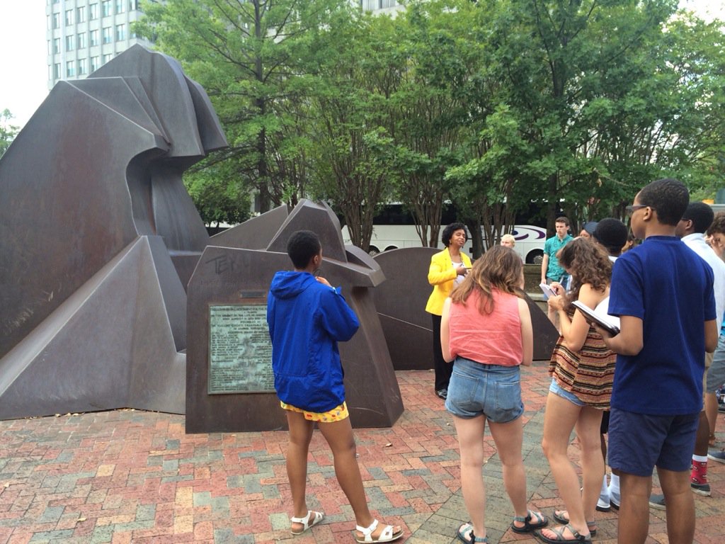 <a href="/ou_dc/">OUDC</a> students are learning about the "I Have Been to the Mountaintop" sculpture right outside the Cannon Center.