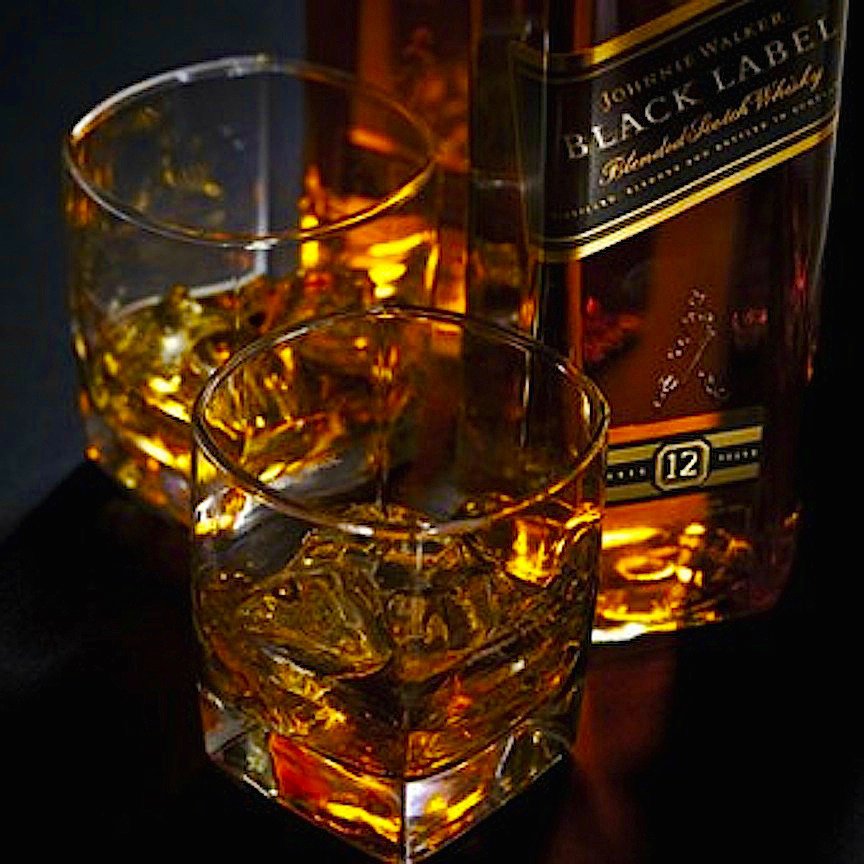 “Whisky is liquid sunshine.” George Bernard Shaw #whiskey #yesplease #johnniewalkerblack #bottleservice