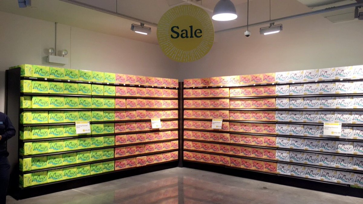 Be sure to come by and check out our HUGE WALL OF LA CROIX!