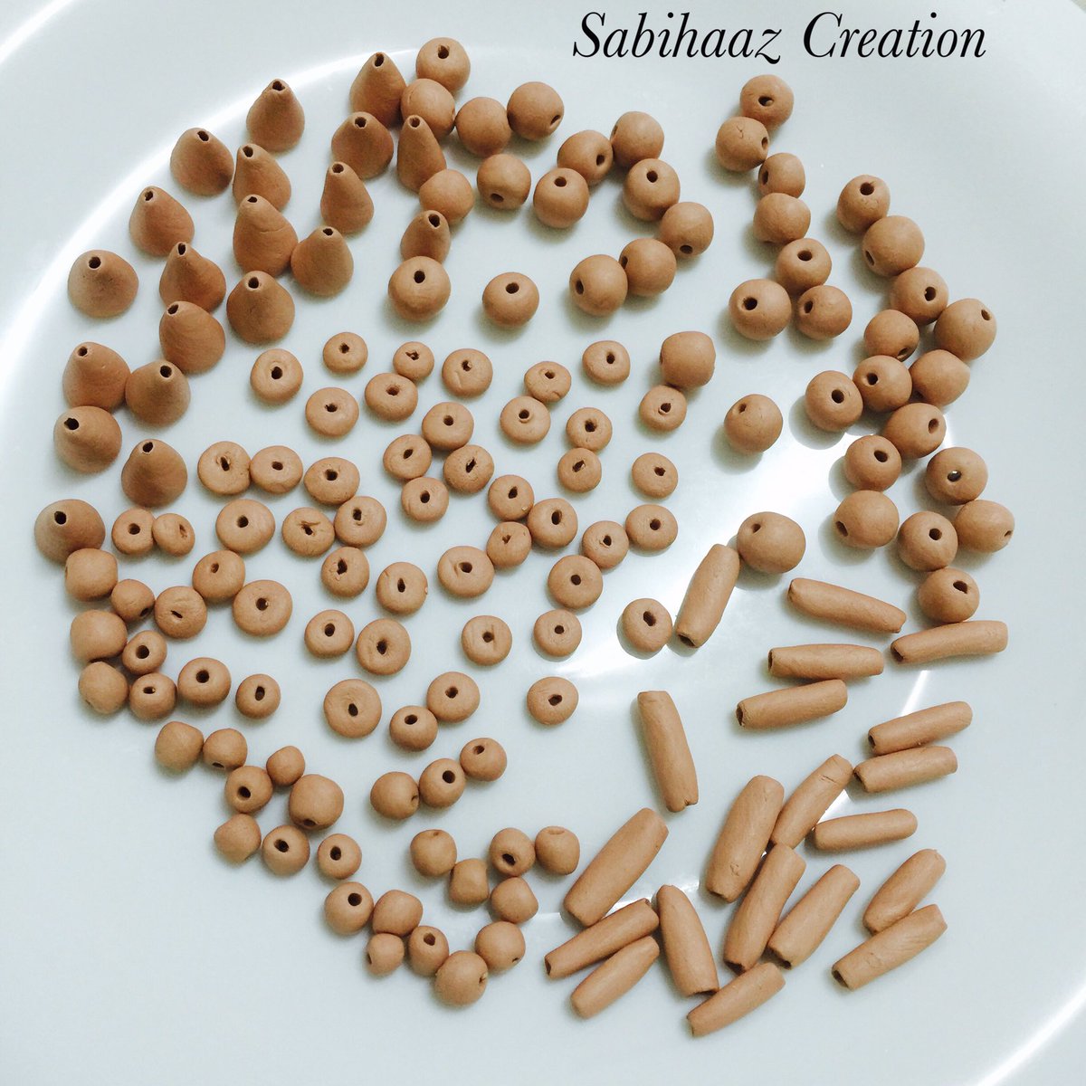sabiha_jewelry's tweet photo. #handmade #clay #ecofriendly #roundbeads #longbeads #conebeads #flatbeads #beads ready for drying #jewelleryforsale https://t.co/xT8lEnwsop