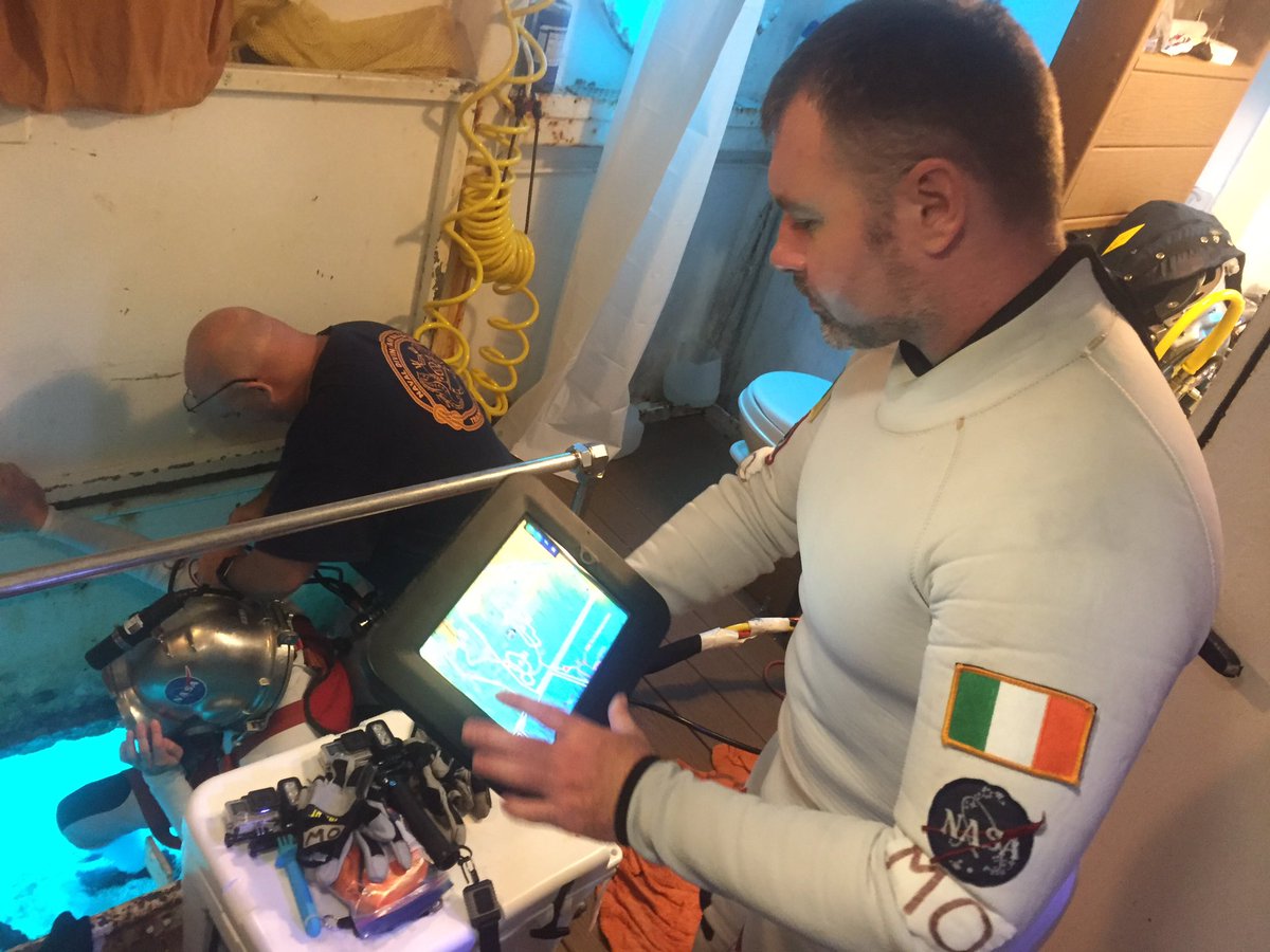 astro_reid's tweet photo. #AstroMegan and @Aqua_OGriofa are suiting up for coral reef exploration. #NEEMO21 Live feed: https://t.co/znwozSrzxl https://t.co/4R0vVTKpE1