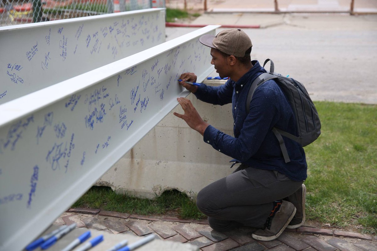 DrakeUniversity's tweet photo. The two structural beams that the Drake community signed this spring were installed in the new STEM@Drake complex. https://t.co/2pzATQR4bH
