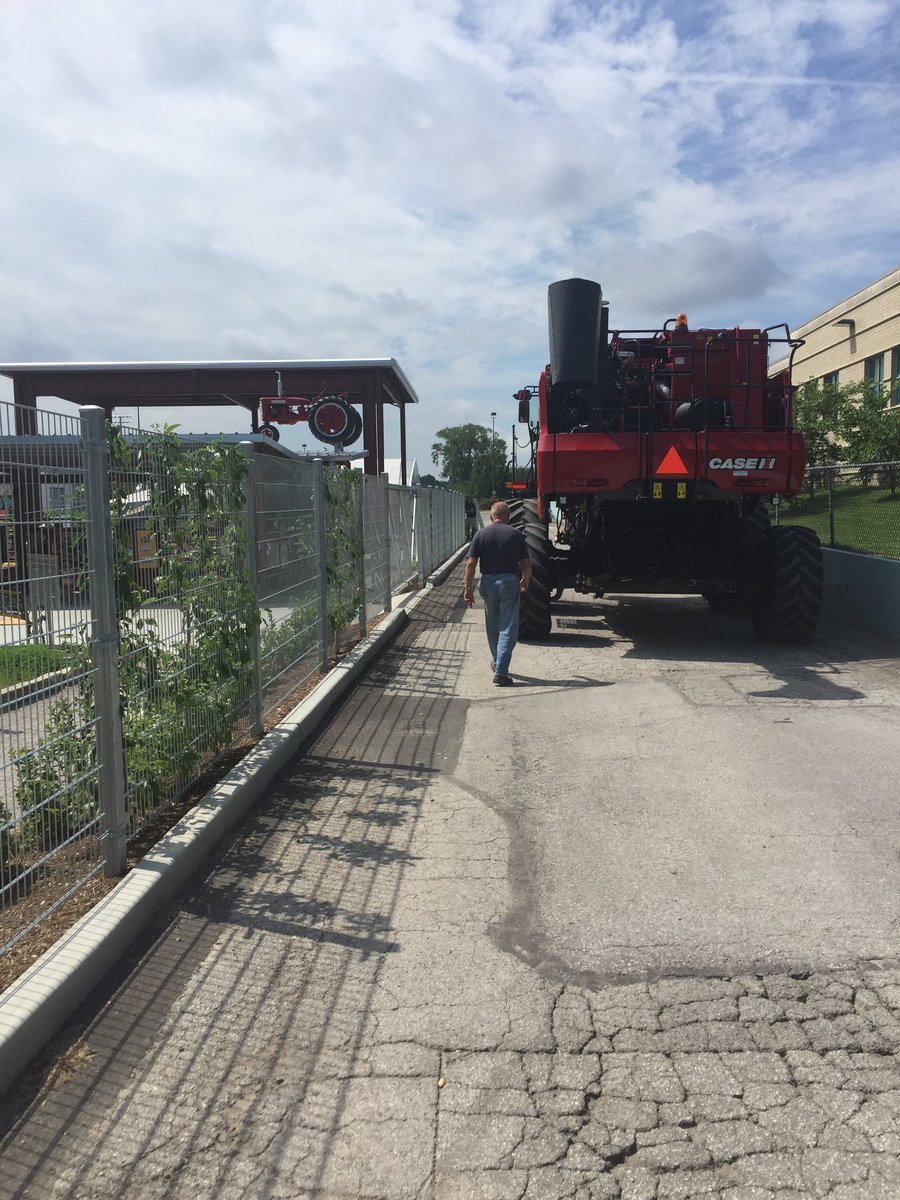 STLScienceCtr's tweet photo. Out with the old in with the new! It's always fun when @Case_IH stops by to replace the #SLSCGROW harvester. https://t.co/SMsI66ZDfR