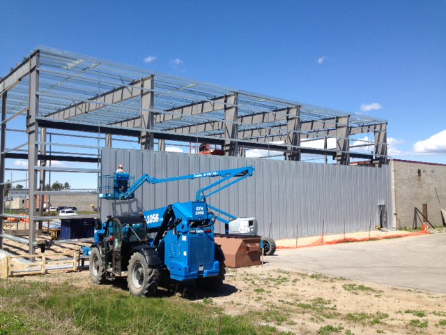 Recently we completed this 75' x 110' Behlen Pre-engineered steel building extension to an existing building.