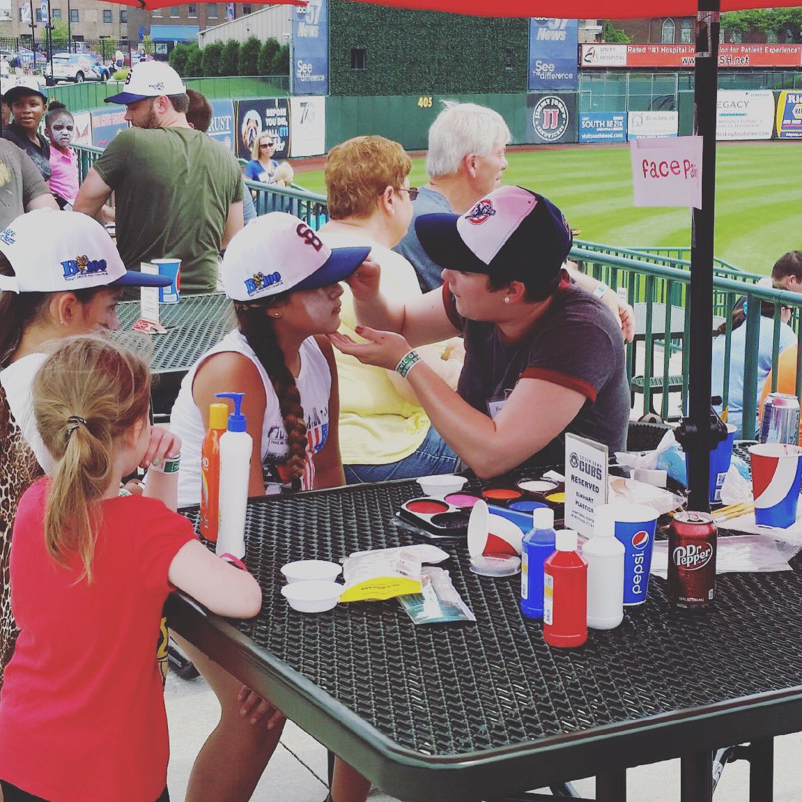 katzakrowski's tweet photo. Painting the children's faces at four winds field https://t.co/P8GPJYt3to