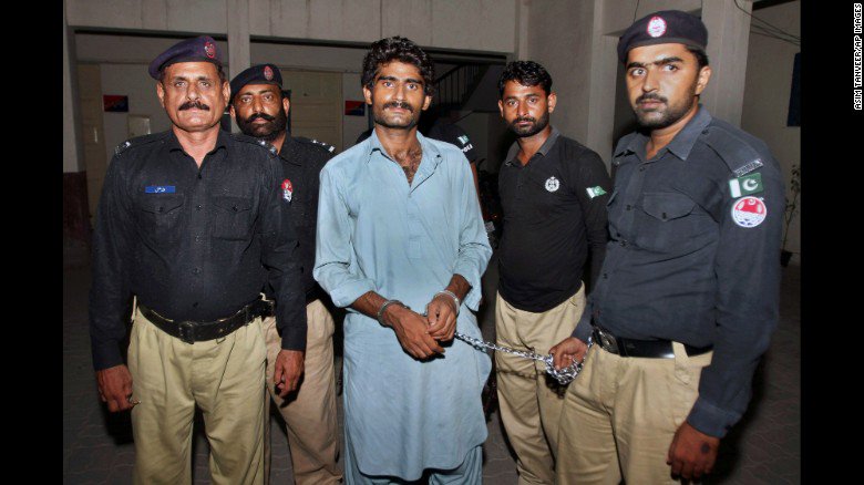 NSWLegalNetwork's tweet photo. Pakistani social media star Qandeel Baloch's brother Waseem Azeem pictured with police after his arrest. @CNN https://t.co/Mx2lYh4xxm