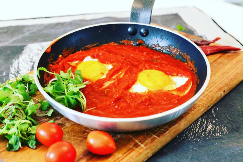MimosaSundaze's tweet photo. Eggs baked in a Napolitana sauce with a sprinkle of Parmesan cheese &amp; bacon. Yummy!! @dolci_sa Just add 🍾! https://t.co/1g33LVAUK5