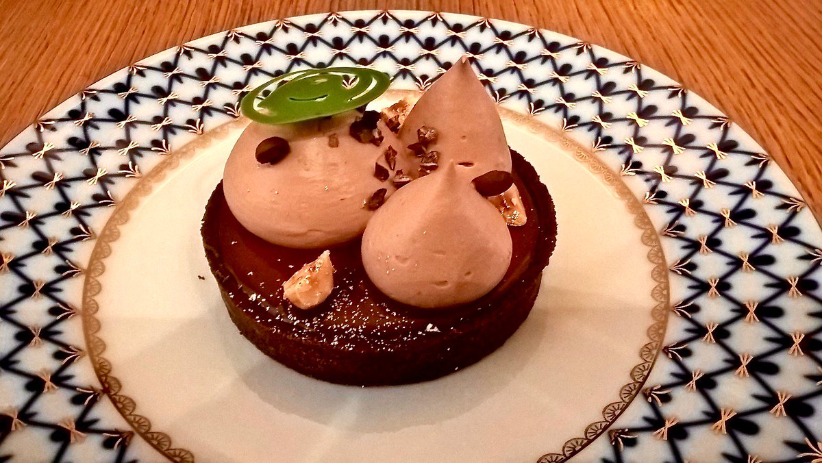 Chocolate and hazelnut pie. At Acide, #Paris <a href="/JONATHANBLOT/">JONATHAN BLOT</a> <a href="/LesBatignolles/">Les Batignolles</a> #yesplease #Paris <a href="/zeparisienne/">the parisienne</a>