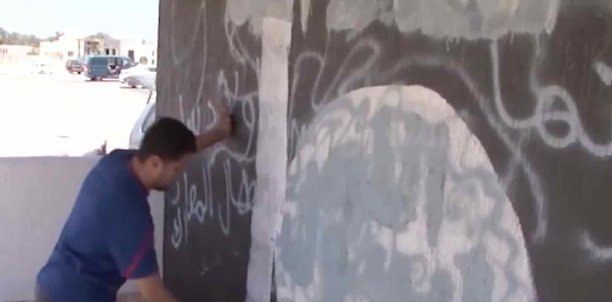alwasatengnews's tweet photo. The town of Harawah launches campaign to paint over #ISIS signs after its liberation. #Libya
https://t.co/gKBjn11IsG https://t.co/L16oL8LQWr