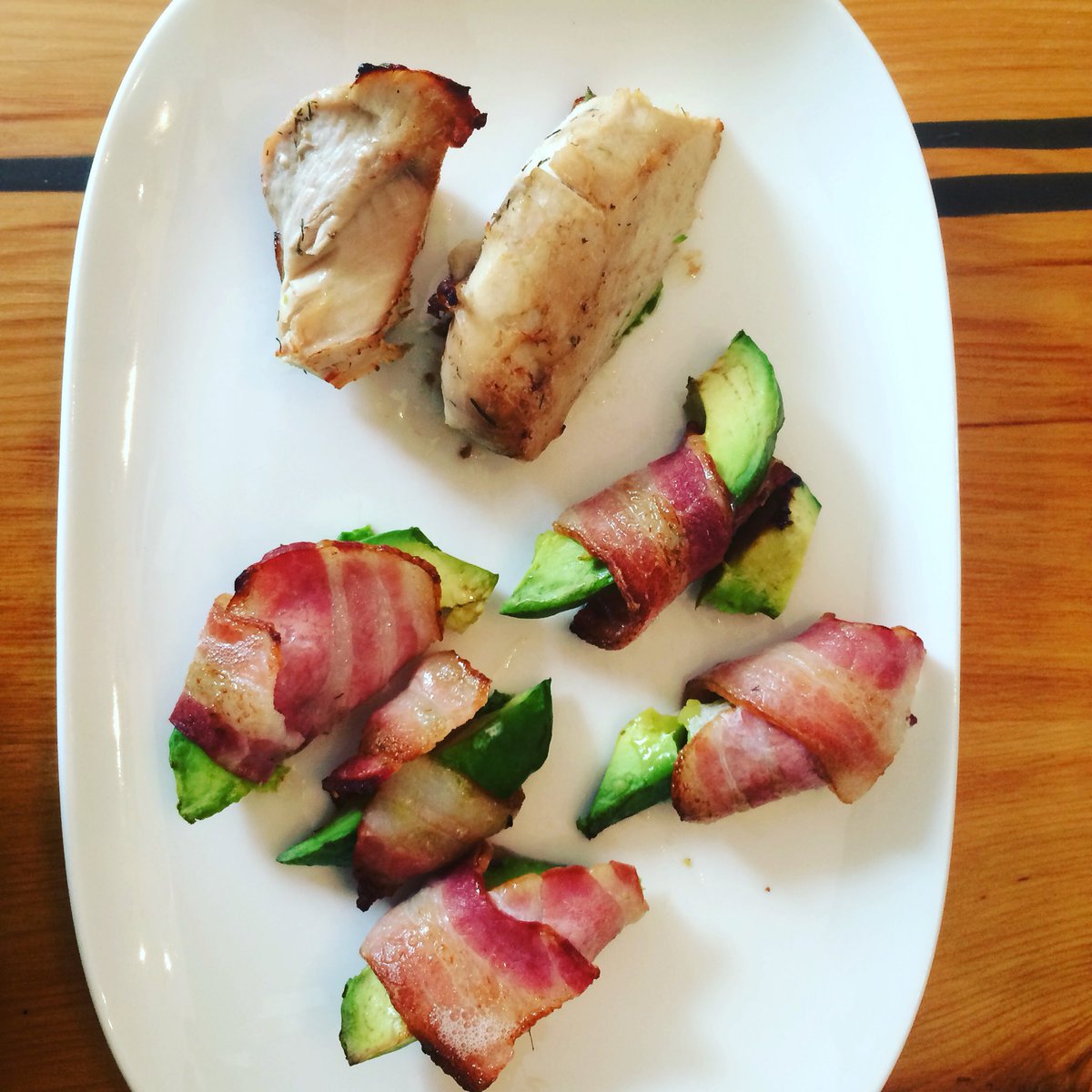 JacobStrength's tweet photo. Bacon wrapped avocado / turkey breast breakfast! #healthyfats #protein #breakfast  #wakeupthebrain @gamewithoutpain https://t.co/74dlj2OK8p