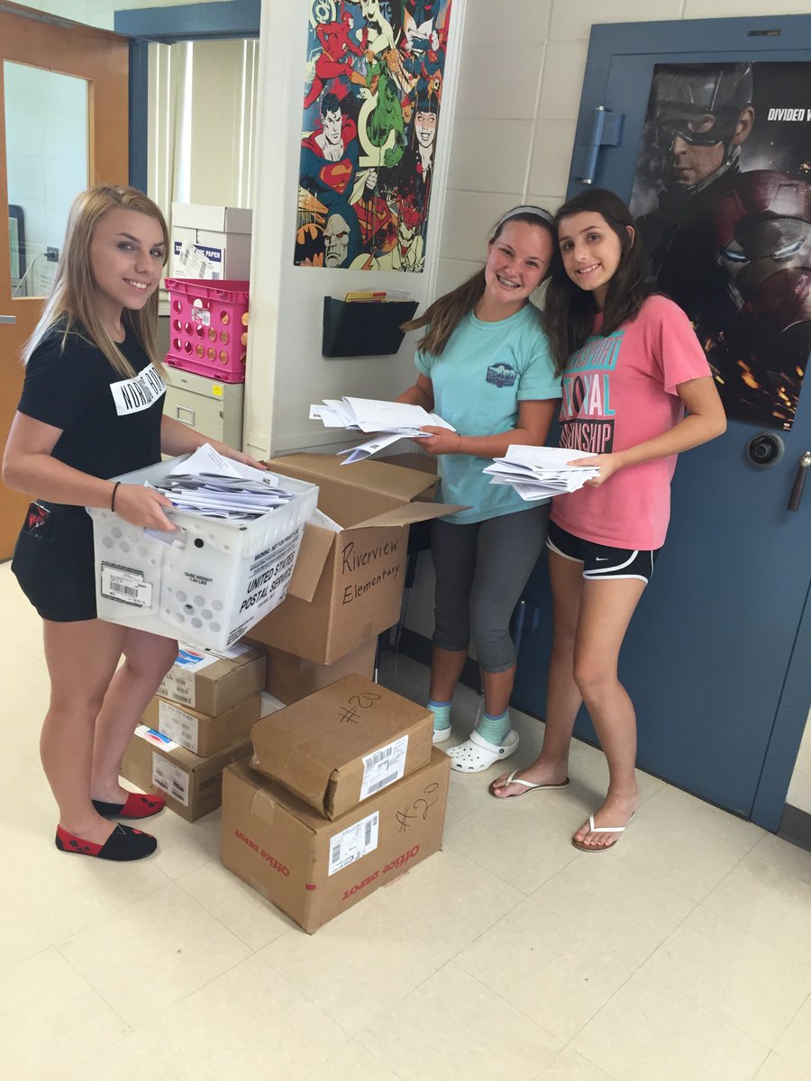 RHS students volunteering at Riverview Elementary sending out teacher assignments!