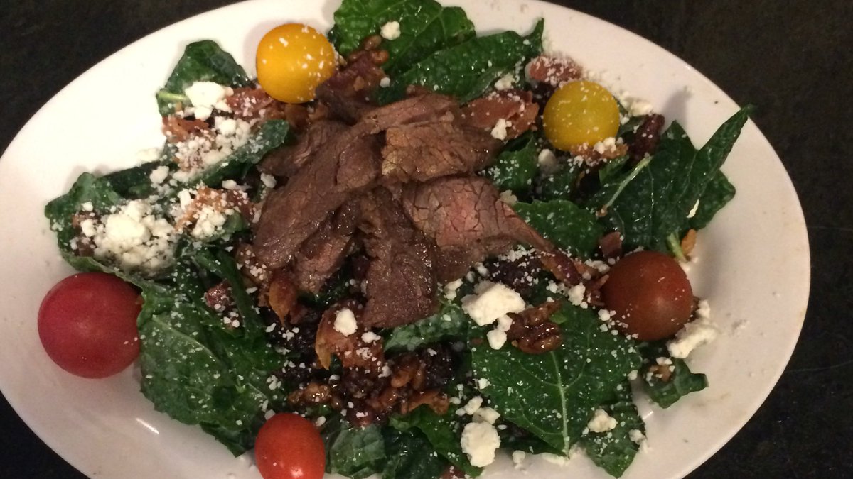 Hillerich Family Farm kale salad with flank steak and heirloom cherry tomato ($9) #farmerofthemonth #lunchspecial