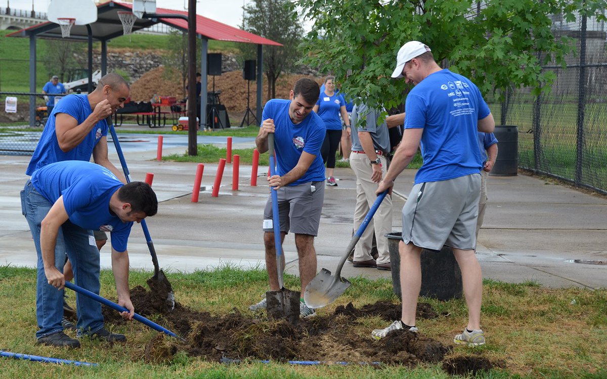 Reds's tweet photo. The 2016 #Reds, P&G, and Cincinnati Zoo Community Makeover is underway in Lower Price Hill. #makeover2016 https://t.co/9ia160malH