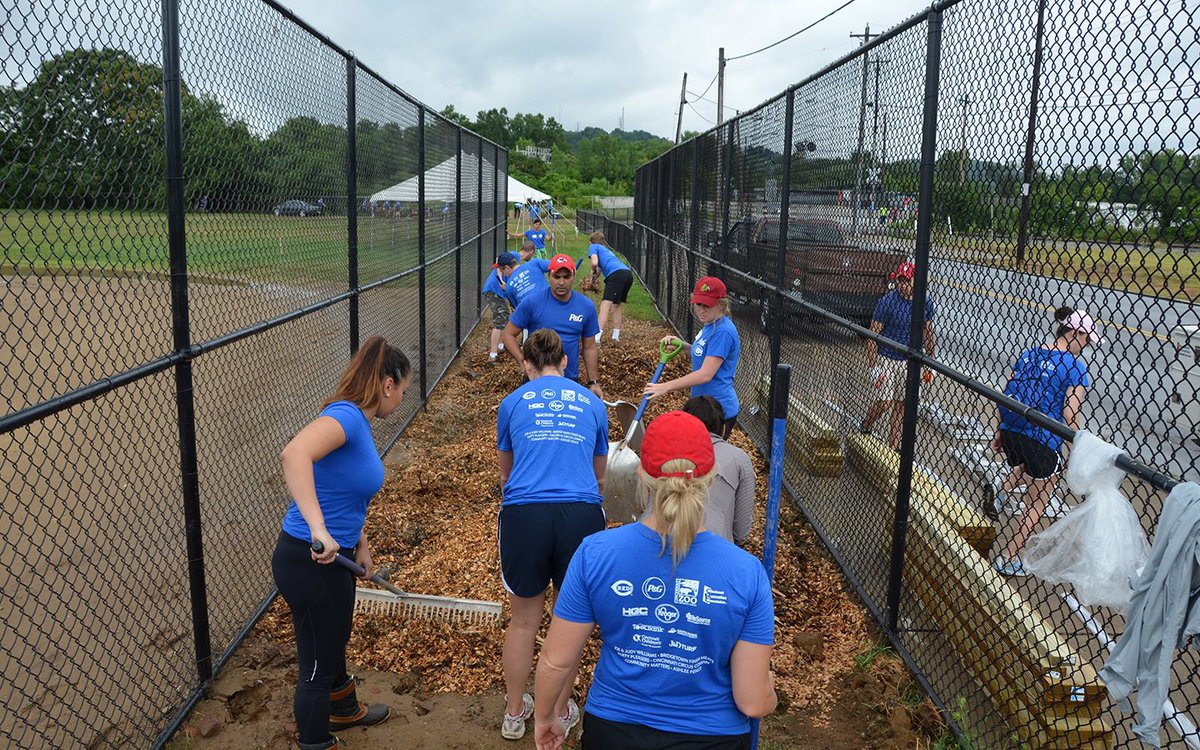 Reds's tweet photo. The 2016 #Reds, P&G, and Cincinnati Zoo Community Makeover is underway in Lower Price Hill. #makeover2016 https://t.co/9ia160malH