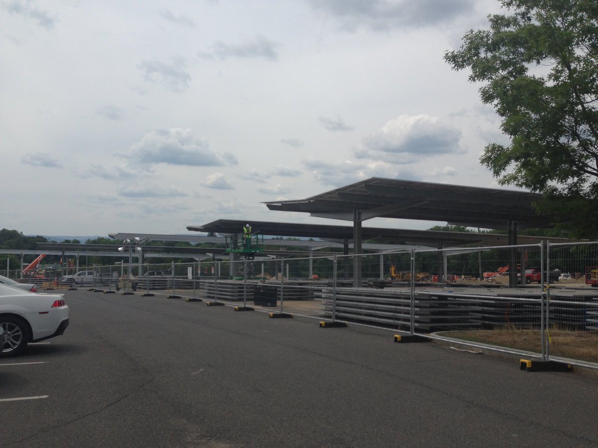 UMassSustain's tweet photo. The solar parking canopies in lot 44 at @UMassAmherst are going up fast. #solar #energy https://t.co/pstpBka1mG