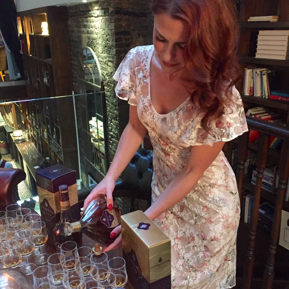 The lovely <a href="/CVambassador/">Rebecca Asseline</a> hosting a tasting of Courvoisier XO with guests at the Tribe networking event #WhyITribe