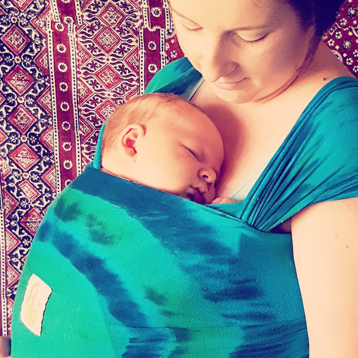 BarnetSlings's tweet photo. Our lovely #slinglibrary volunteer Natalie and 5 week old Oliver 💙 Snuggles in a #tiedye @SnugiWraps #stretchywrap https://t.co/bp9I2ZPnzR
