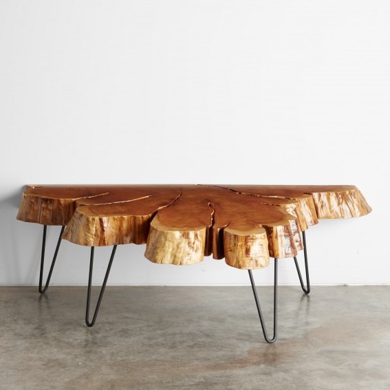 A cedar crosscut half-flare tabletop with black steel hoop legs. Buy online it online. bit.ly/2atVmX1