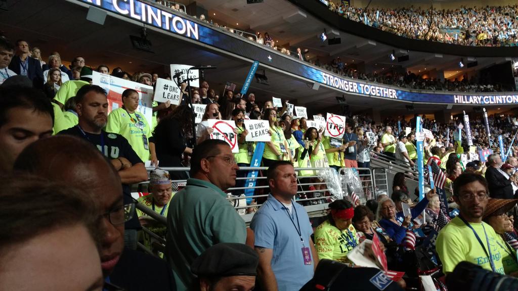 MakUpFront's tweet image. Washington's delegation split--some cheering wildly, Sanders delegates standing in protest.  #DemsInPhilly