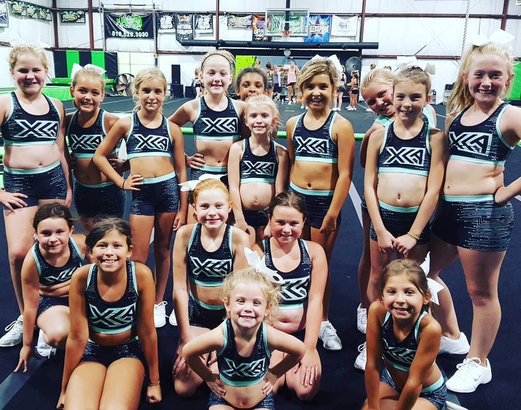 xcacheer's tweet photo. How cute cute cute are these girls in their new practice outfits!!! We love them!! Thanks @rebelathletic #xcacheer https://t.co/dykA5GgX5E