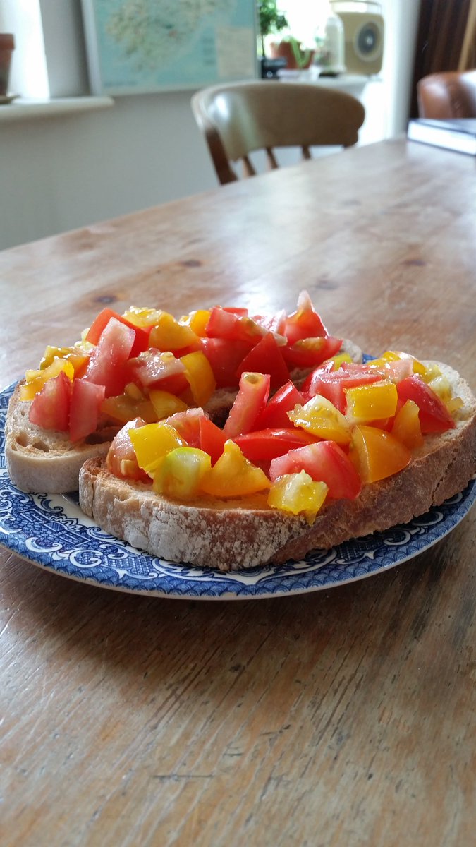 ThriftBee's tweet image. #ATomatoADay First ripe toms on garlic smeared sourdough toast.