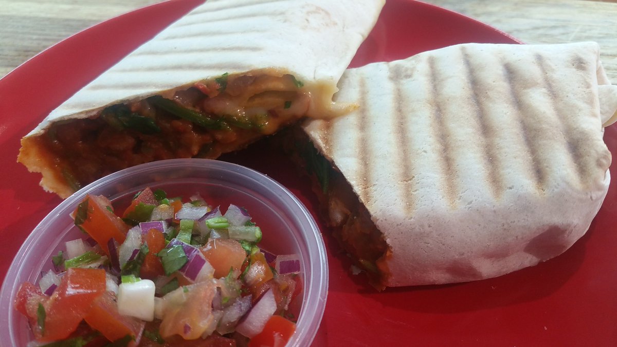 Looking for lunch? Refried been tortilla wrap top it off with salsa cheese &amp; soured cream #lunchN19 #delicious
