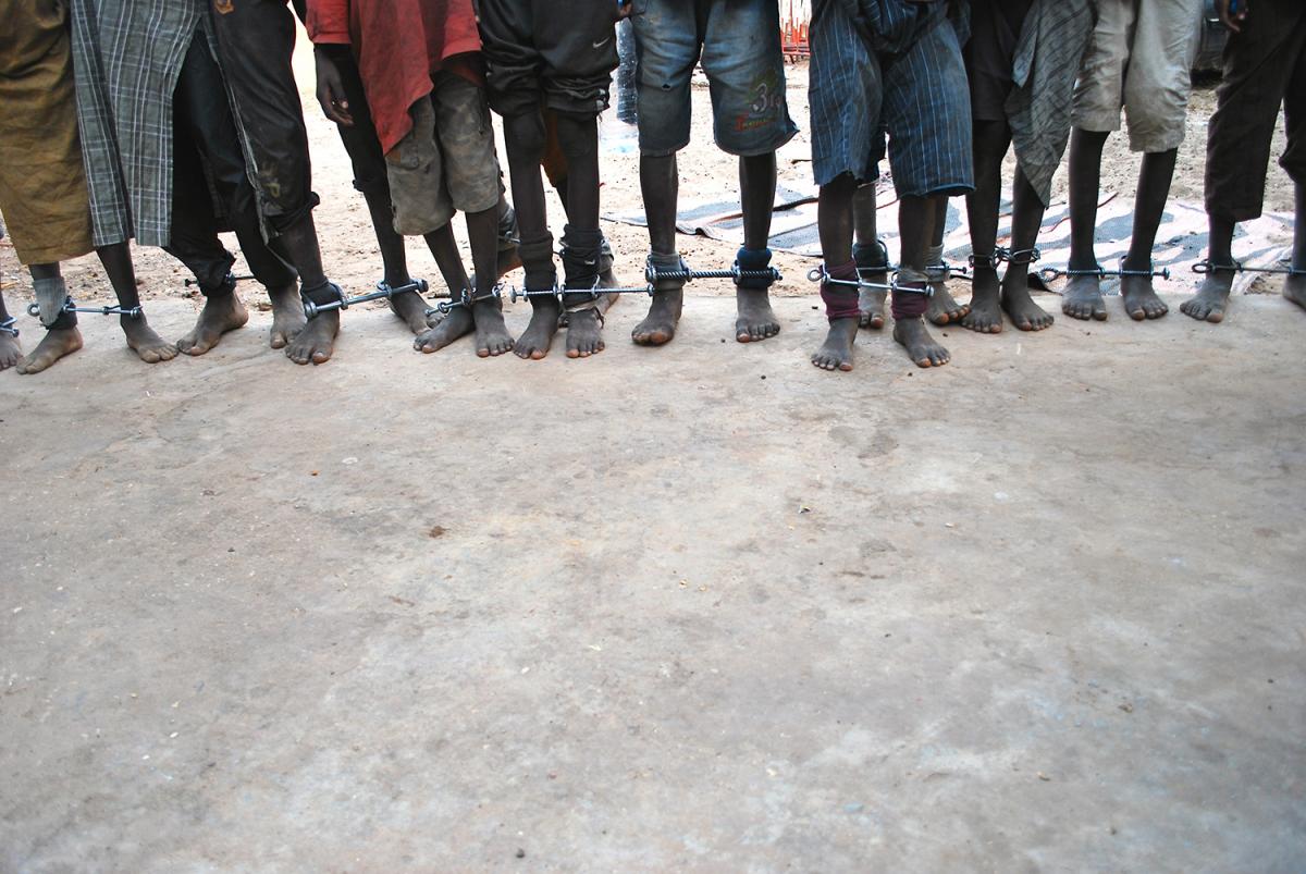 NSWLegalNetwork's tweet photo. Dozens of talibé boys aged 6 to 14 are shackled with iron bars in Quranic school in Diourbel, Senegal @hrw https://t.co/bv8gwr8K23