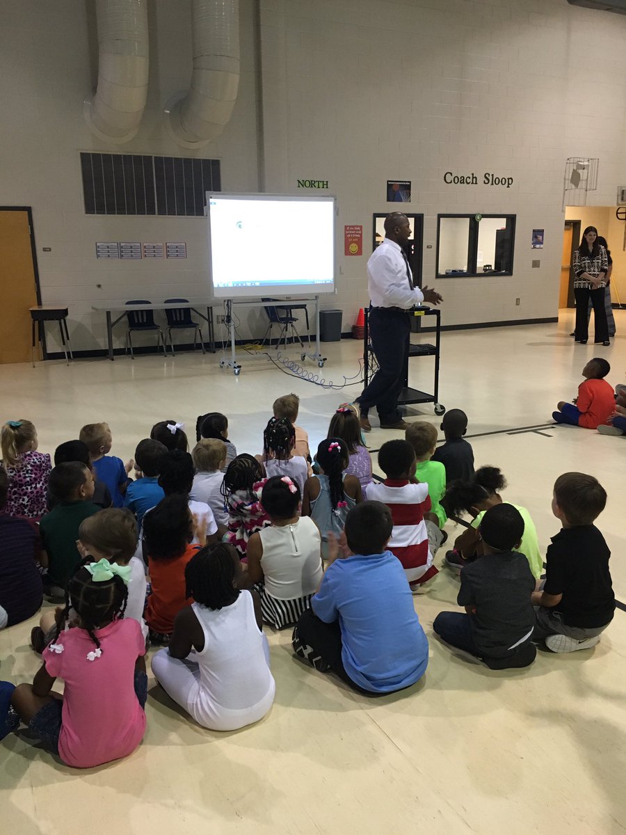 SSESPBIS's tweet photo. Mr. Hughes meets with Kindergarten to discuss PBIS! They are ready earn Spartan bucks! #ncssbethebest @SSE_NEWTON https://t.co/rYGG31MBSb