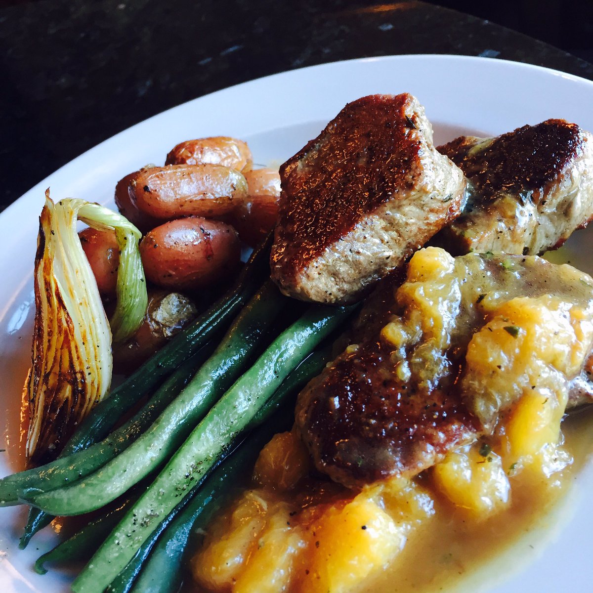 Roasted veal medallions sea salt red skin potatoes, heritage beans, caramelized onion with a peach brandy sauce