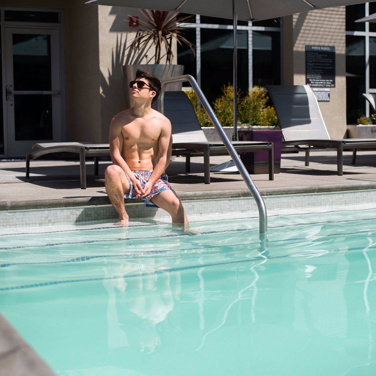 Sitting By Pool Rapper Laying by the pool listening to music. Tweet me some songs so I can ...