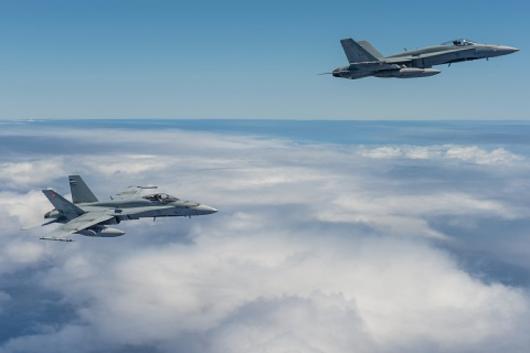 The CF-18 in action, high above Pearl Harbor, Hawaii! Credit: MCpl Chris Ward #FighterFriday #RIMPAC #RCAF
