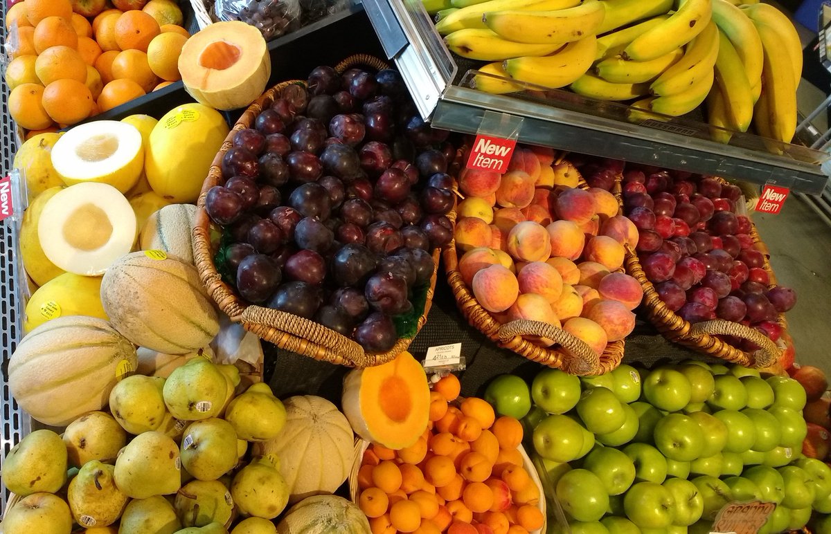 We're bursting with colourful BC fruit! Relish it while it's in season. #organicproduce #plums #peaches #apricots