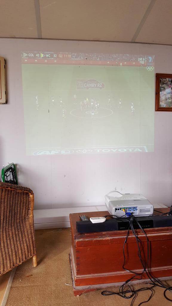 Piesman74's tweet photo. @mfozz74 @carlosmoir not a bad setup. #mancave #screamasloudasilike #AFLPiesEagles https://t.co/Qz2oz74rvV