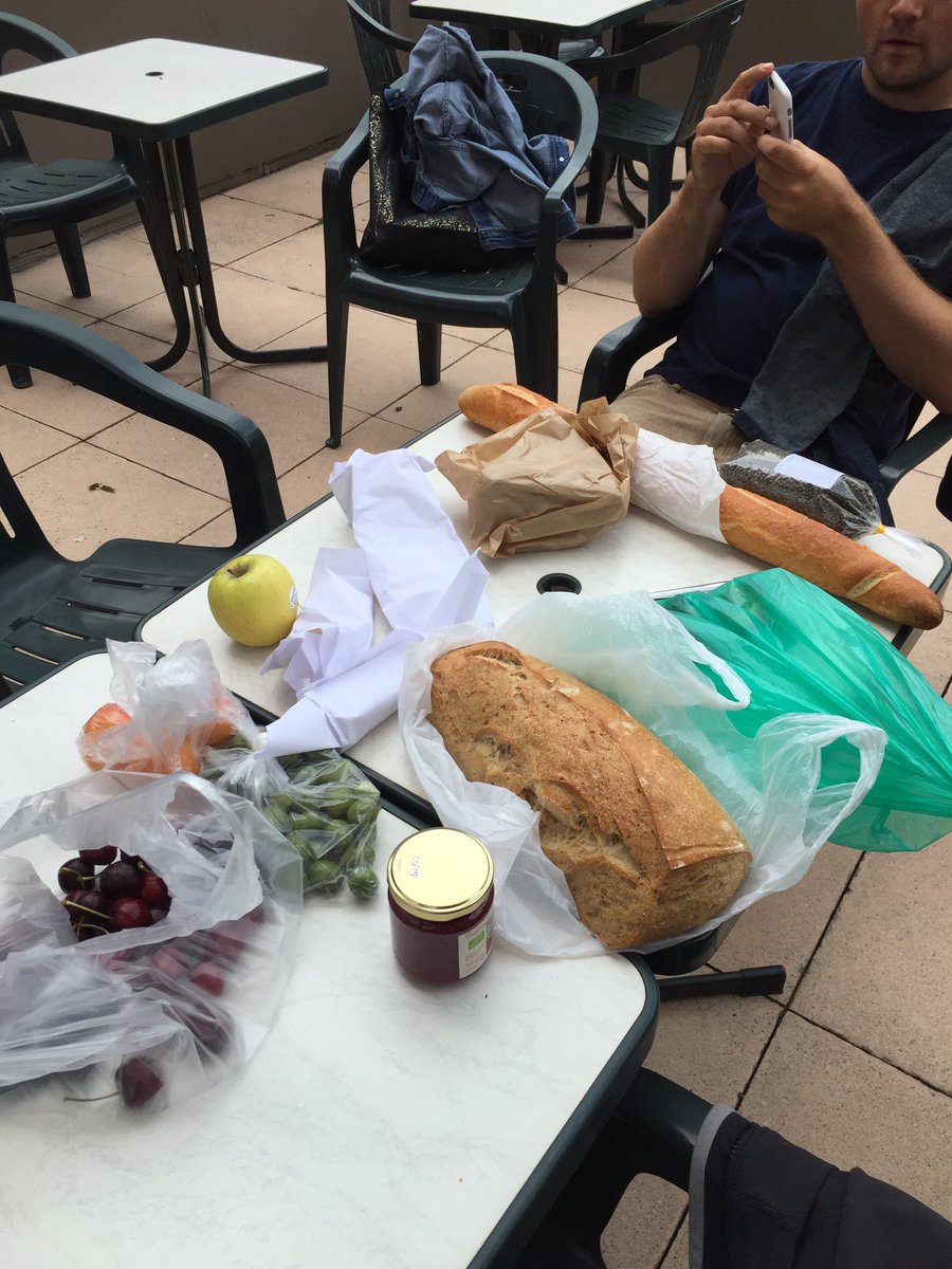FrontCountrySF's tweet photo. Lunch time in Le Puy. That's cheese wrapped up in all that paper #tourlife #france #nonpasteurized https://t.co/5ffv3izuKZ