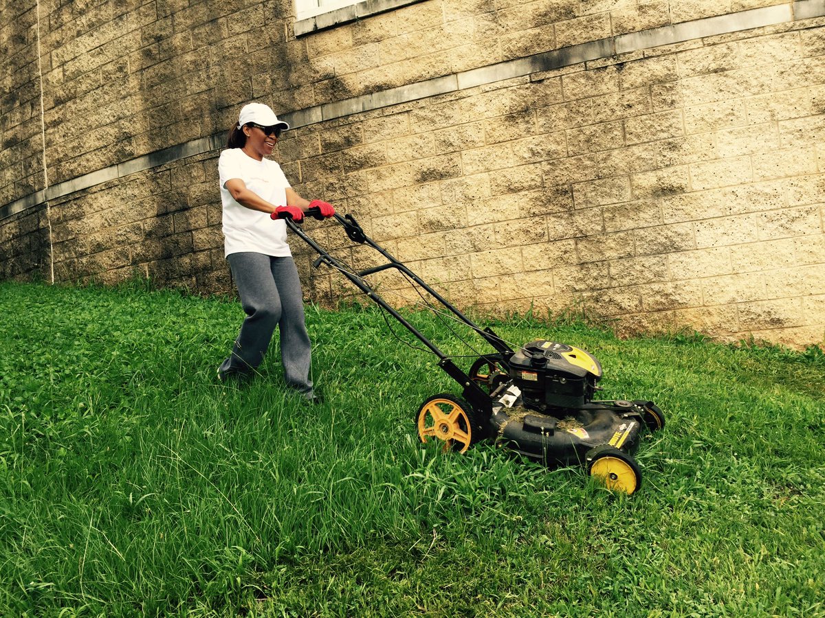 Dr. G is up early to cut grass at Avondale Elem as part of @HandsOnBham's campus cleanup today.