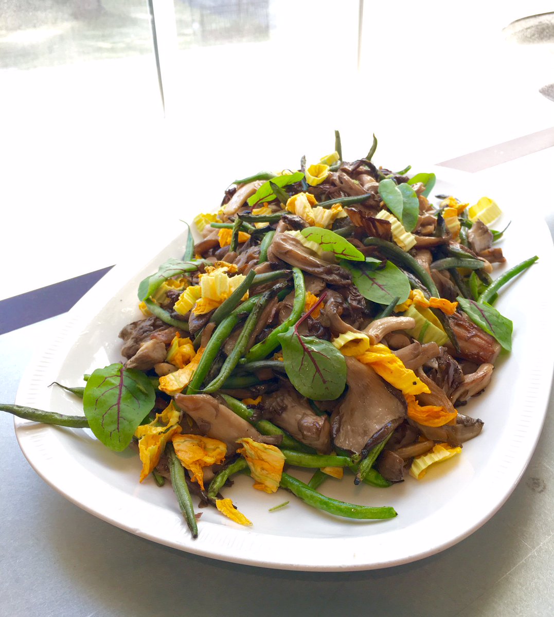 Hen of the woods mushrooms, haricot verts and squash blossoms...veggie happiness in our cold case!