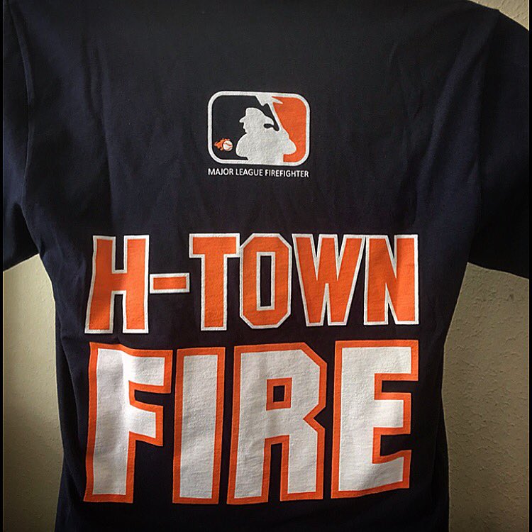 rgffoundation's tweet photo. H-Town Fire Shirts are back in stock! Navy and orange. Visit https://t.co/LBYx3kRjBf to order! #RGFF #HTownFire https://t.co/fDCcwdtas2