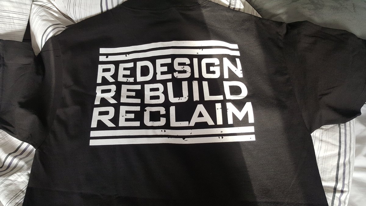 Max_Silver11's tweet photo. Finally got the #futureuniversalchamp Shirt @WWERollins https://t.co/cAbHJyFaao