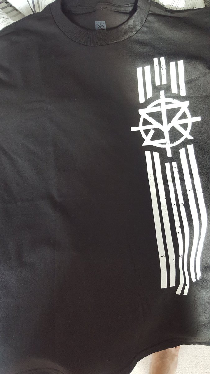 Max_Silver11's tweet photo. Finally got the #futureuniversalchamp Shirt @WWERollins https://t.co/cAbHJyFaao